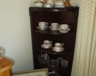 one of two corner shelves & china