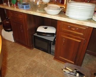 Formica top with two kitchen cabinets