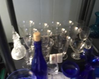 Set of clear glasses - lots of blue bottles & collectibles 