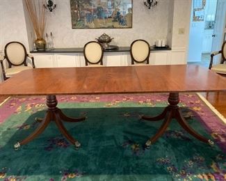 Double pedestal cross banded mahogany dining room table