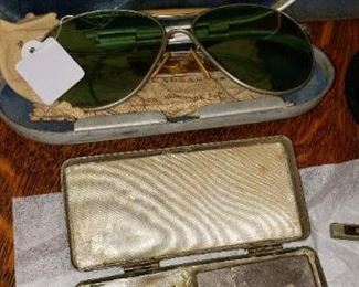 Military issued sun glasses & inside of razor kit
