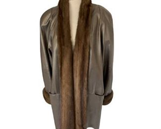 Lot 256
Ladies Cache Bronze Leather & Mink Trimmed Coat