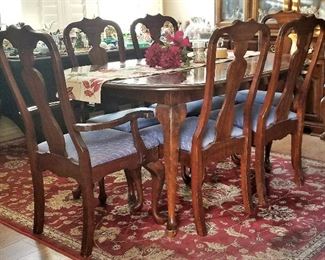 Cherry Wood Dining table and chairs. Kincaid series. There is a perfect size china cabinet. Not too big.