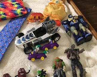 A TMNT & a power ranger dune buggy, some type of Macfarlen zombie guy