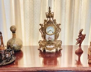 Wood carvings and New Haven French style clock