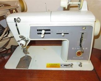 Singer Sewing Machine & Cabinet