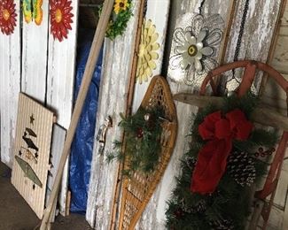 Farmhouse Decorative pieces, antique sled and snow shoe.