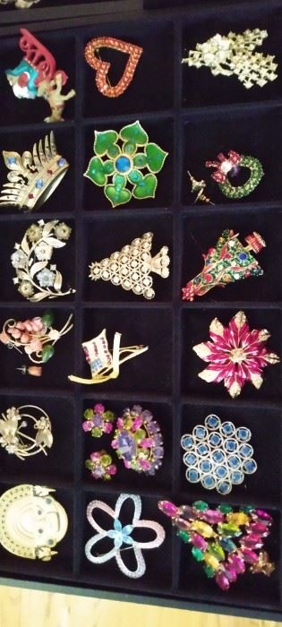 We have tons of Brooches and pins 