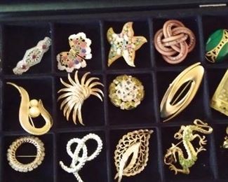 We have tons of Brooches and pins 