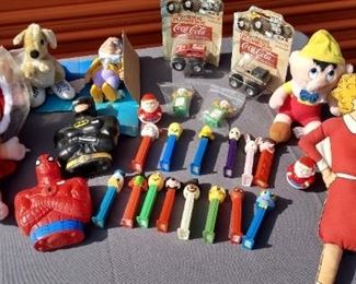Muppet Babies and Pez Dispensers, Coca Cola Mini monster Trucks, Vintage Spiderman, and  Batman shampoo bottles
