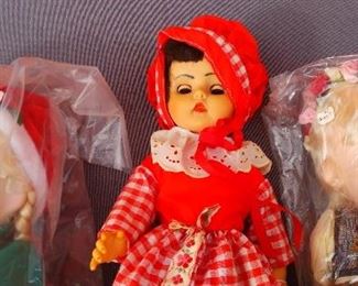 Little Red Riding Hood doll and Precious Moments dolls