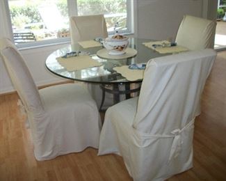 Round Glass top Table with Metal base and 4 Chairs