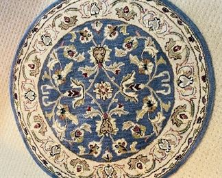 $60   #6 Bombay Carpet round blue  • 3’9” by 3’9”