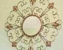 $68   #61 Metal mirror above bed Fleur de Lys • 30x30