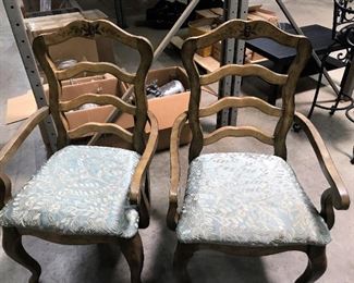 Two of the six matching chairs.