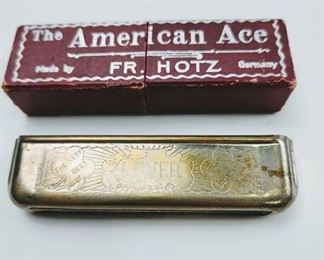 American Ace harmonica, engraved Love.