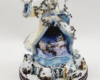 Thomas Kinkade, this one rotates.  Super rare.