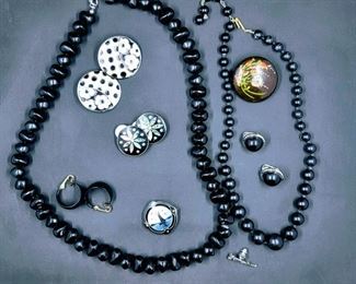 Black costume jewelry.  Boat boat is 925.