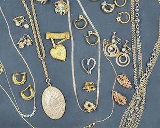 Gold tone with lockets.