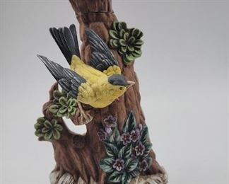 Whiskey bottle with bird.