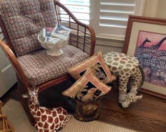 Rattan side chair, safari theme pillows and figurines