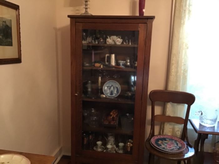 Beautiful oak display cabinet. Locks even, and we have a key!