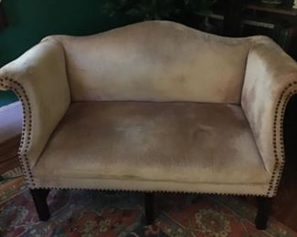 Small camel back sofa