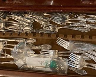 King Richard sterling. Place settings for 14 with up to 28 pieces of spoons and salad forks. Many serving pieces.