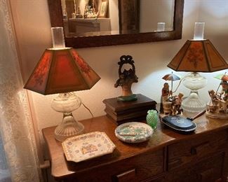 Sweet lamps, nice Knick knacks on lively vintage chest.