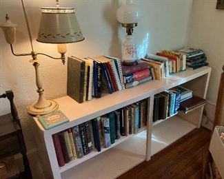 Lots of books and lamps