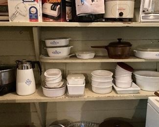 Corning ware plus small pine bench. Lots of small appliances. Some never even opened.
