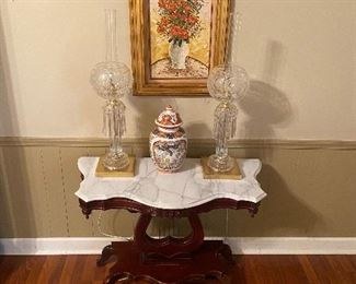 Marble top table with lovely pair of crystal lamps