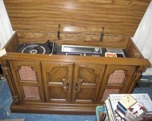 Magnavox stereo console with Record Player, Cassette, and 8 Track