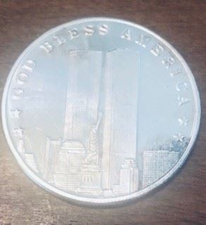 Front side of One troy  Ounce of Silver Twin Towers 