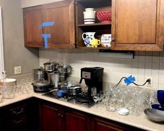 Lots of kitchen items - several sizes of wine glasses.