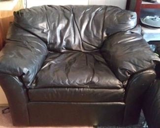 1 of 2 Black leather chairs