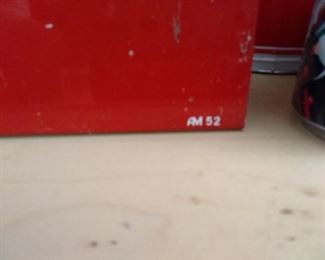 AM52 is on the right corner of the double Coke sign