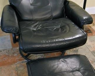 leather recliner with ottoman (in reclined position)