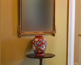 table, vase, mirror