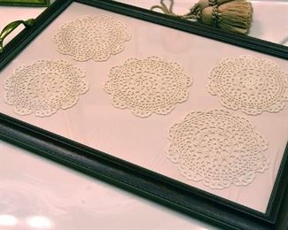 tray, doillies under glass