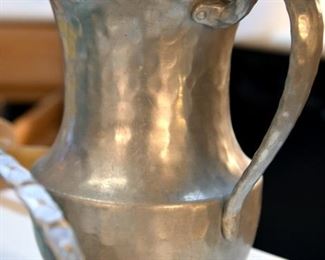 metal peened pitcher