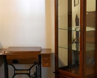 curio cabinet and Singer sewing machine (machine inside)