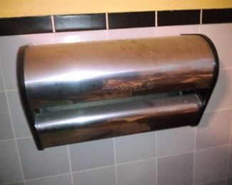 81. METAL TOWEL DISPENSER $15