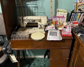Sewing machine with cabinet