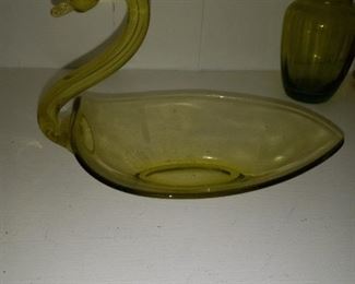I have a yellow & green glass swan, identical.