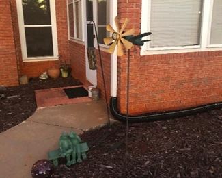 okay like this is a mutant green caterpillar that has fallen in love with a whirligig 