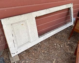 This is a fabulous heart pine door - very heavy! Approx 10' tall. A custom piece of stain glass would look awesome in it