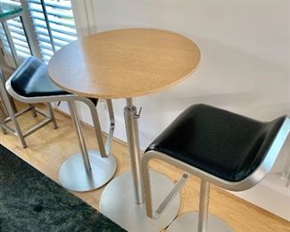 $595 - La Palma adjustable height chairs and table with polyform seats and stainless frames.  3 pcs.