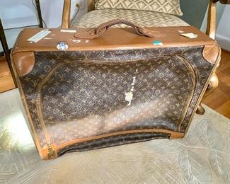 $795 - Louis Vuitton soft sided suitcase as shown;  20.5"H x 25"W x 9.5"D