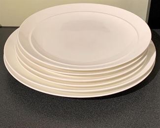 $30 - Lot of six Crate & Barrel plates; four (4) 9" diameter and two (2) 10.5" diameter
